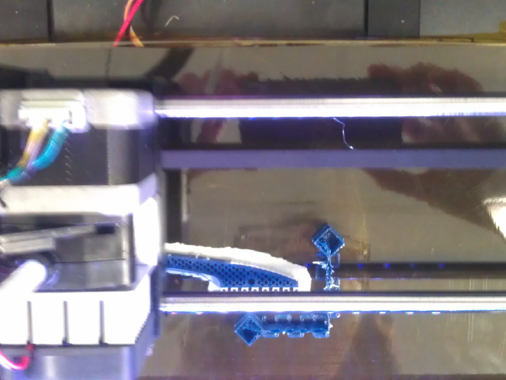 3d printer printing a clip