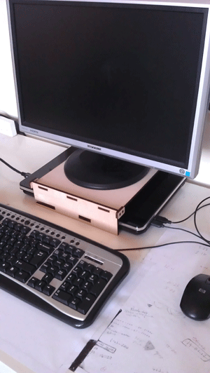 Final desk monitor stand in action