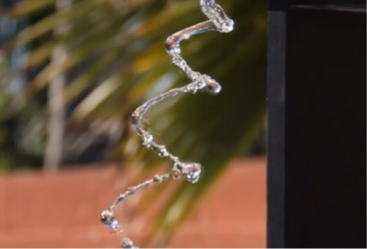 water coming out of a house making an wave pattern