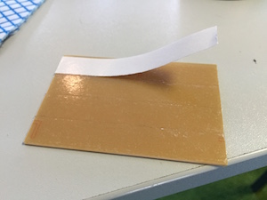 Peeling off double sided tape