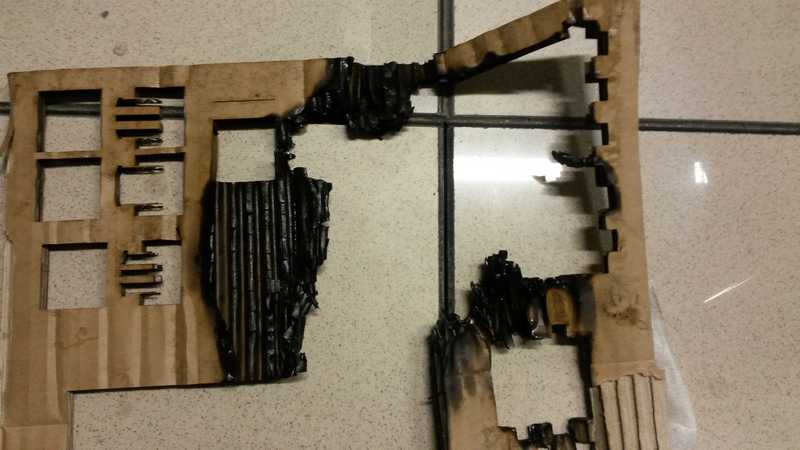 bending cardboard big fire