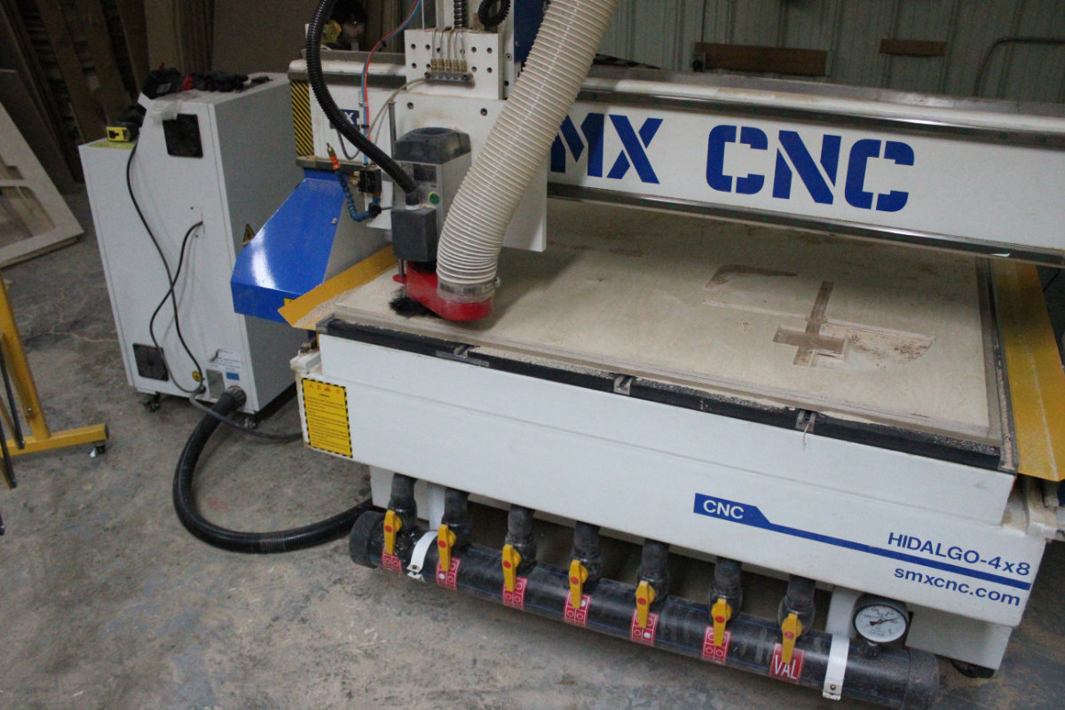 The CNC Machine with the suction table control valves