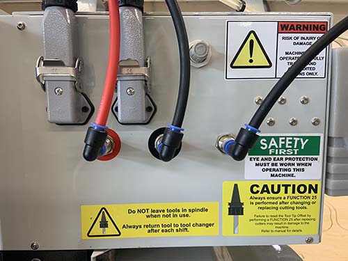 Warning signs regarding the spindle and tool operation
