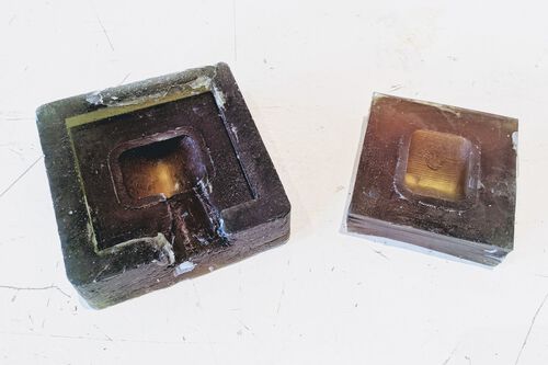 The two sides of a dice mold