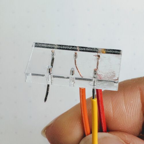 Stripped wires glued in holes
