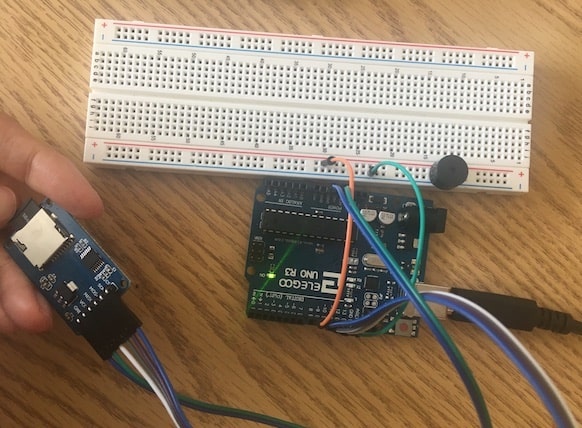 Arduino board hooked up to SD card reader and buzzer
