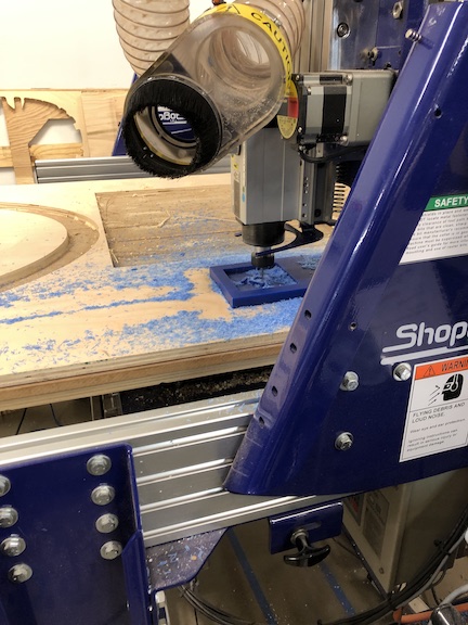 Roughing cut on the shopbot into blue wax block