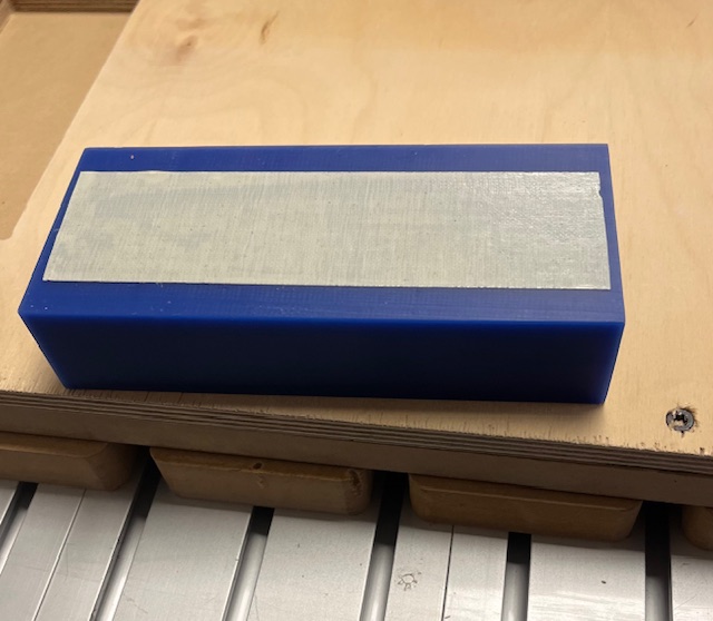 Double sided tape on millable wax