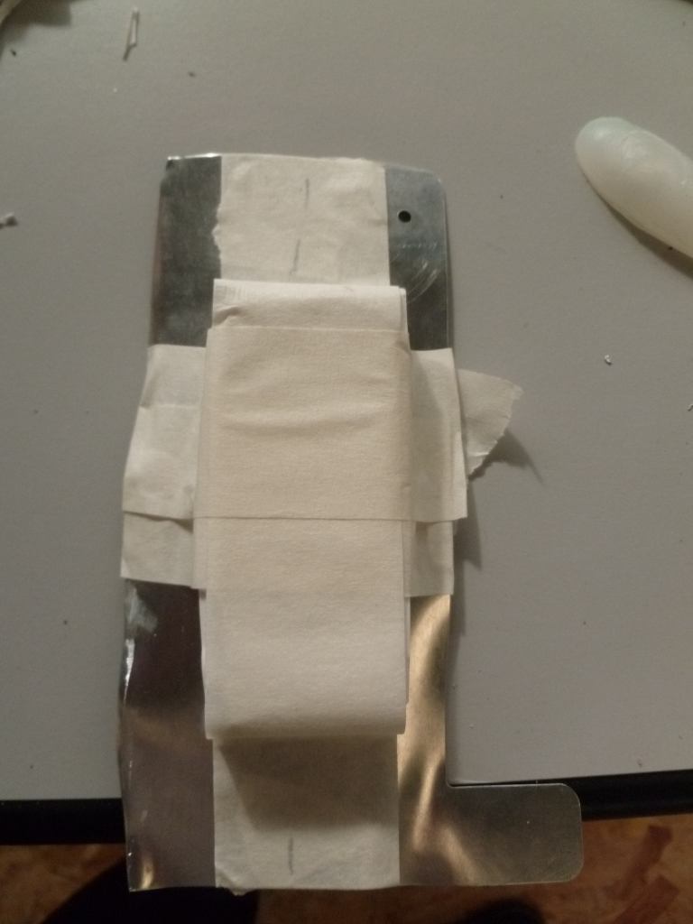 the mold taped to the aluminium sheet : ready to cast