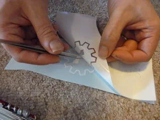 its easier to use masking tape for vinyl transferring and weeding.Make sure the adhesive is less sticky(use your body to remove glue)
