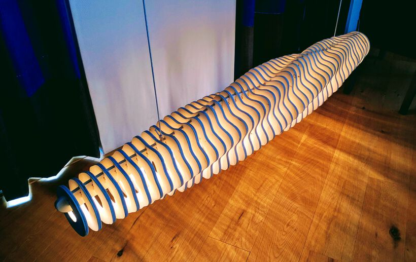 A 1.5m long wooden lamp from the Computer-Controlled Machining week