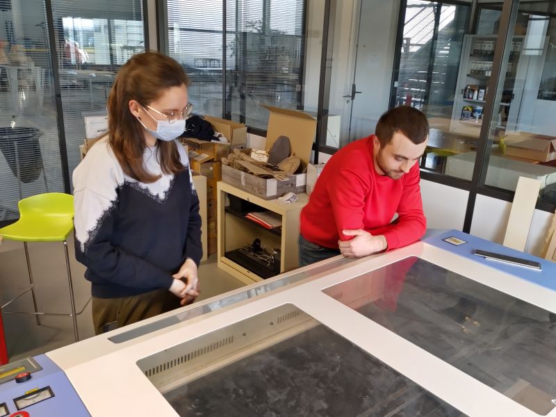Aurore Kubica (FabAcademy student) & Théo Gautier (AgriLab co-instructor) supervising lasercut.