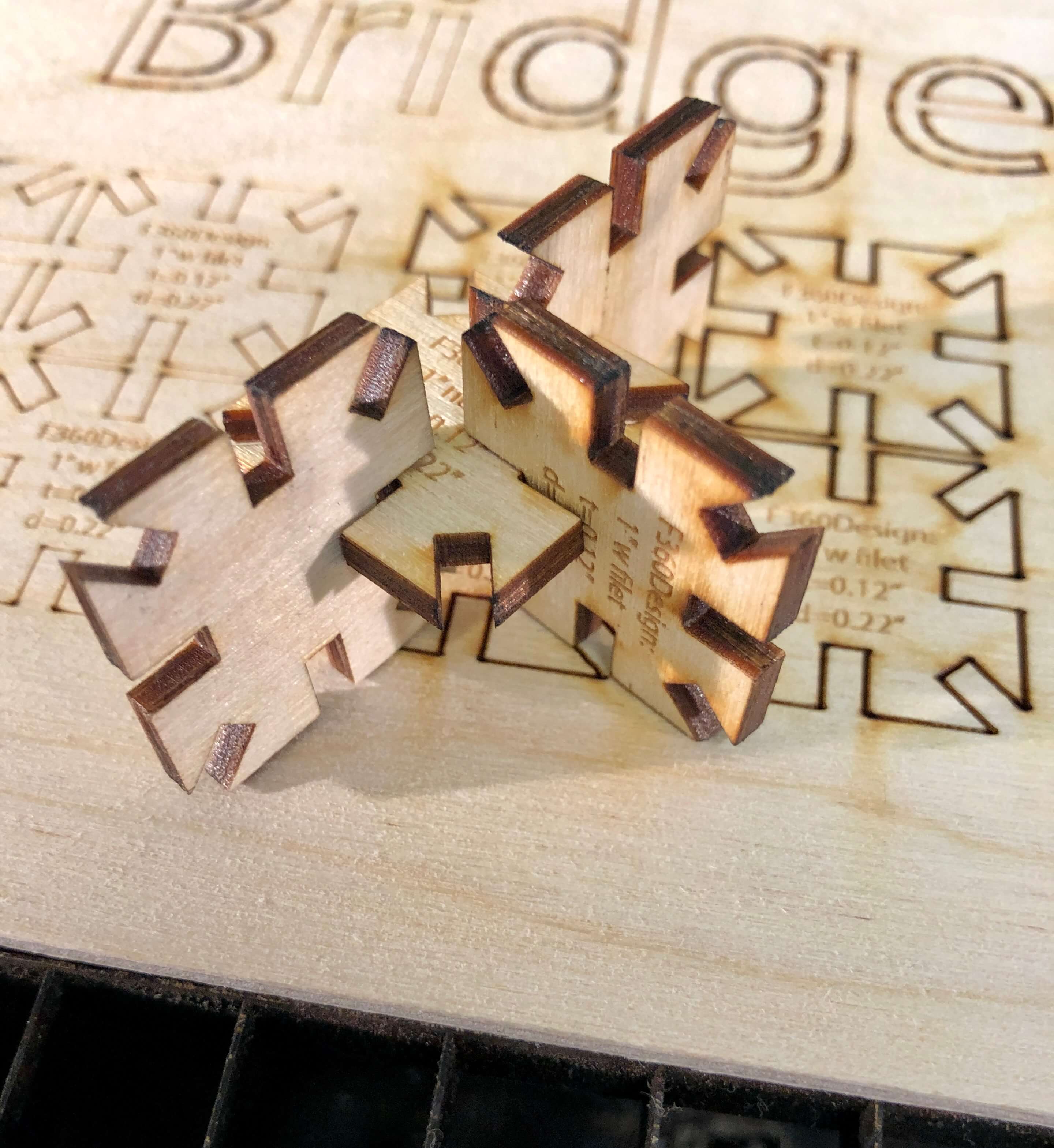 assembled laser cut notch blocks on plywood