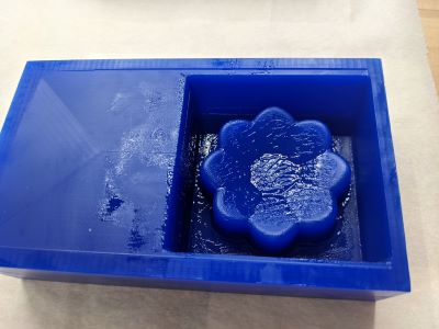 Wax mold with goop on it after removing silicone