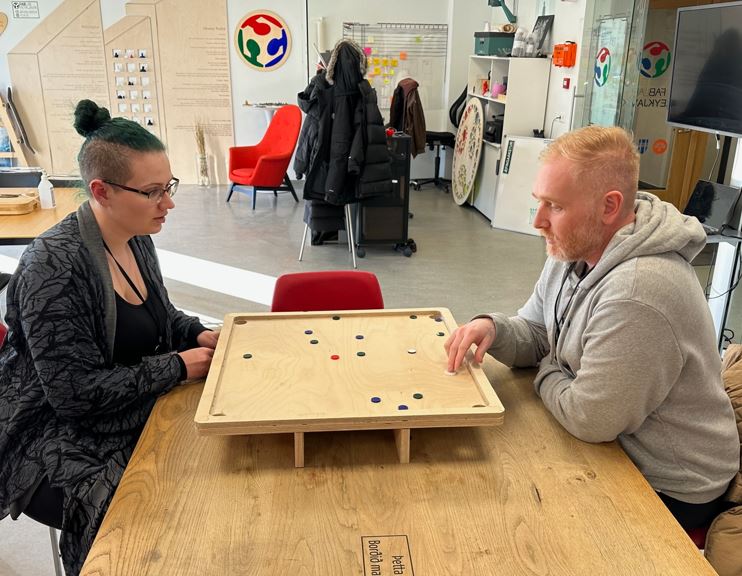 Carrom board playing