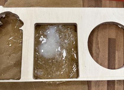 Melted plastic in mold