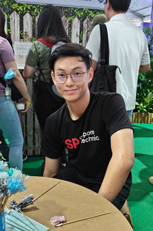 Singapore Polytechnic student maker seated at the Future YOUth event