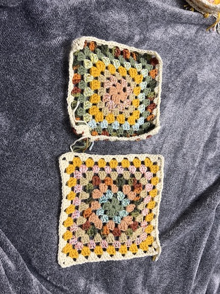 Crocheting granny squares.
