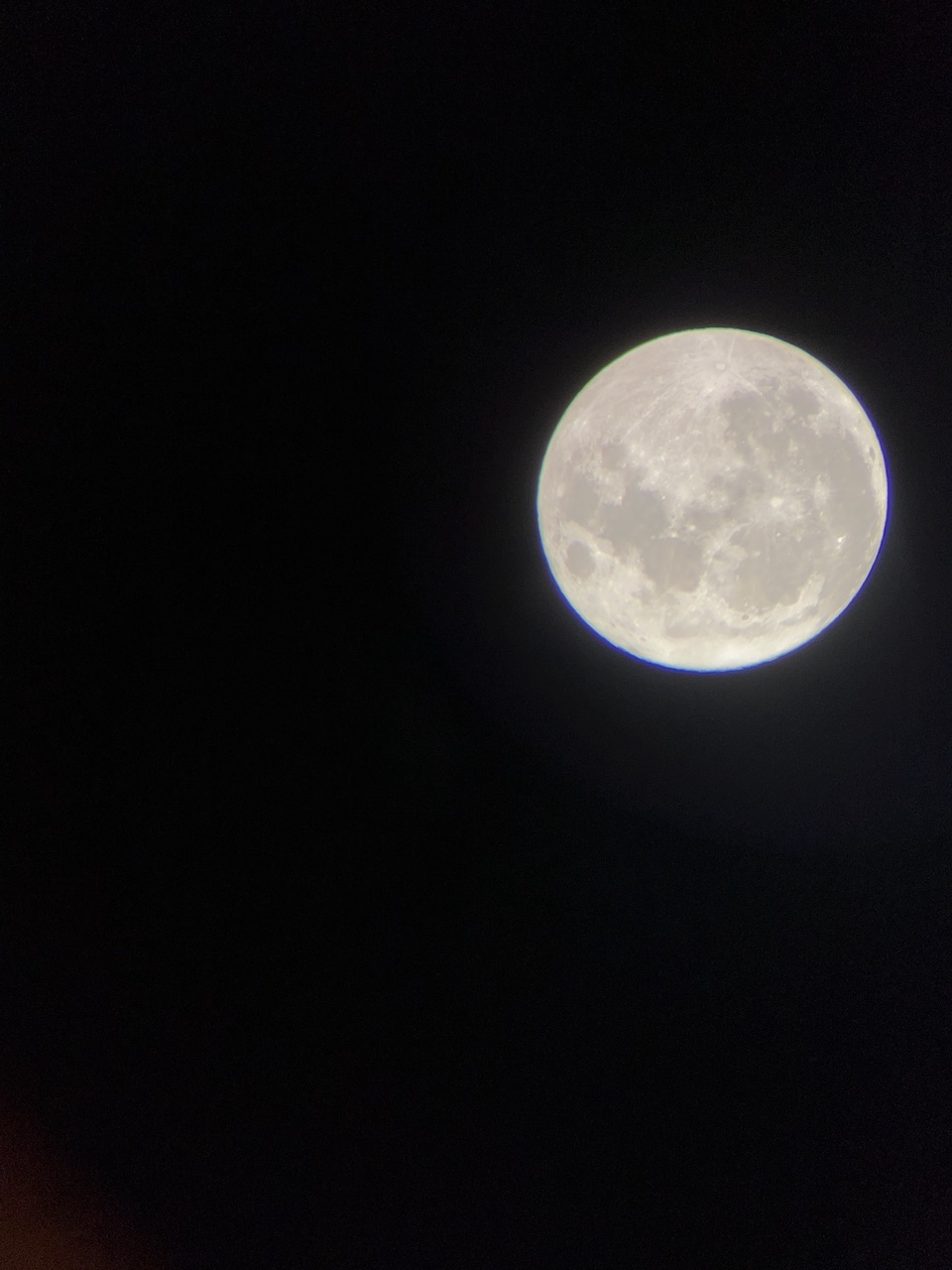 Photo through my telescope of the moon.