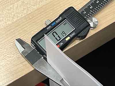 picture of measuring thickness of paper