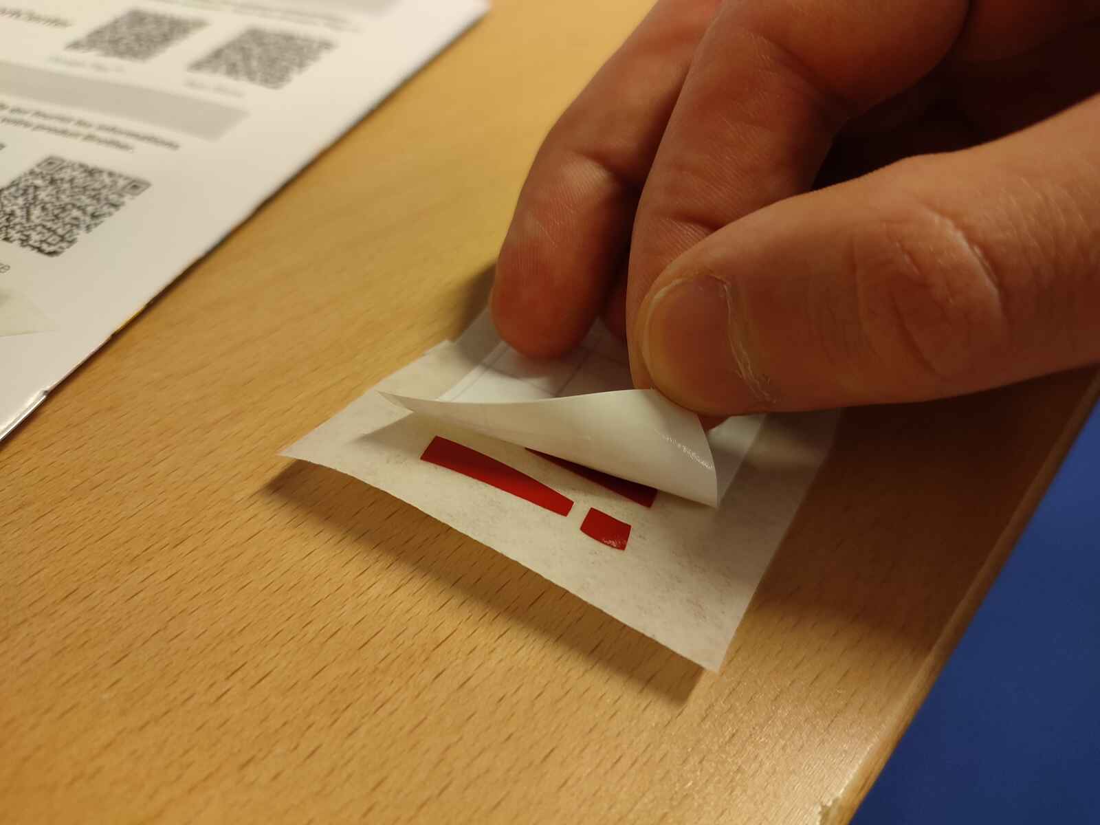 peeling off adhesive tape