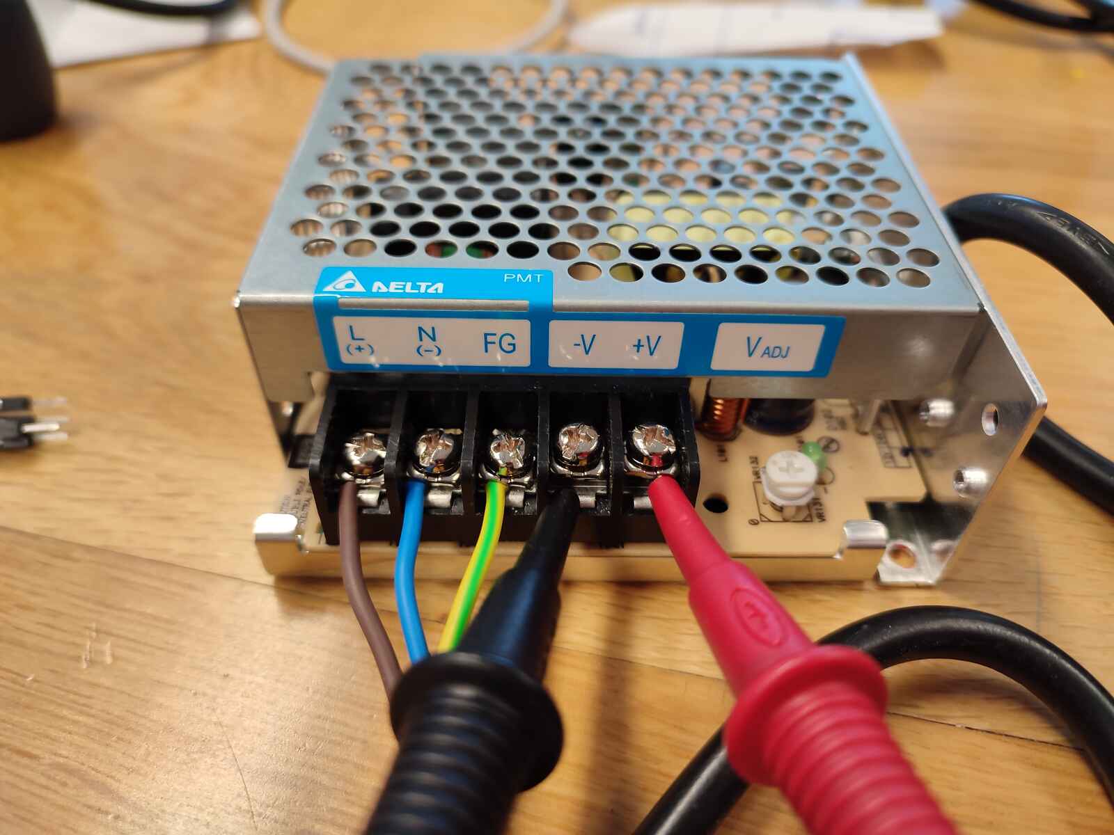 checking 12v adapter with multimeter