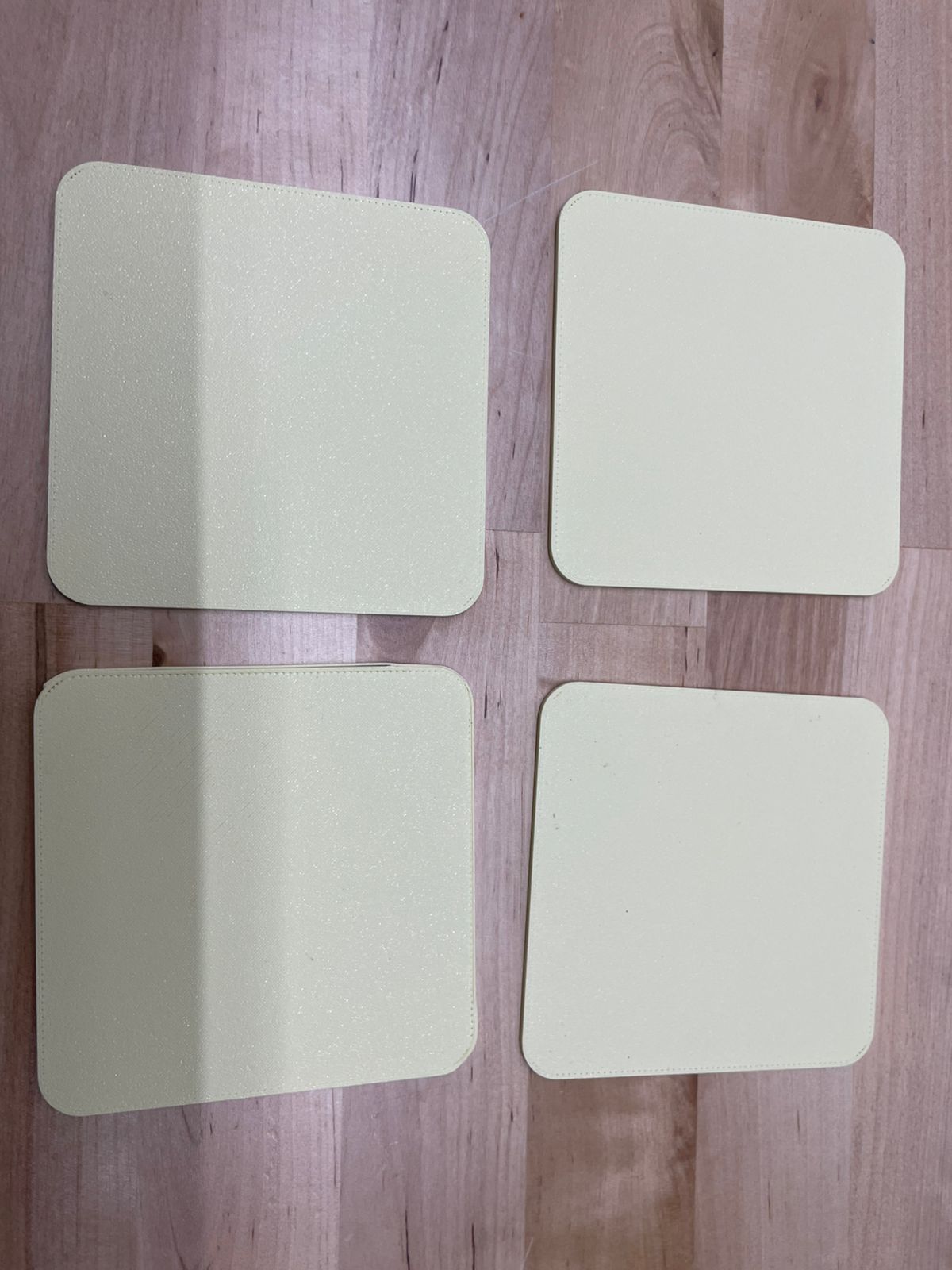 Four printed yellow PLA plates