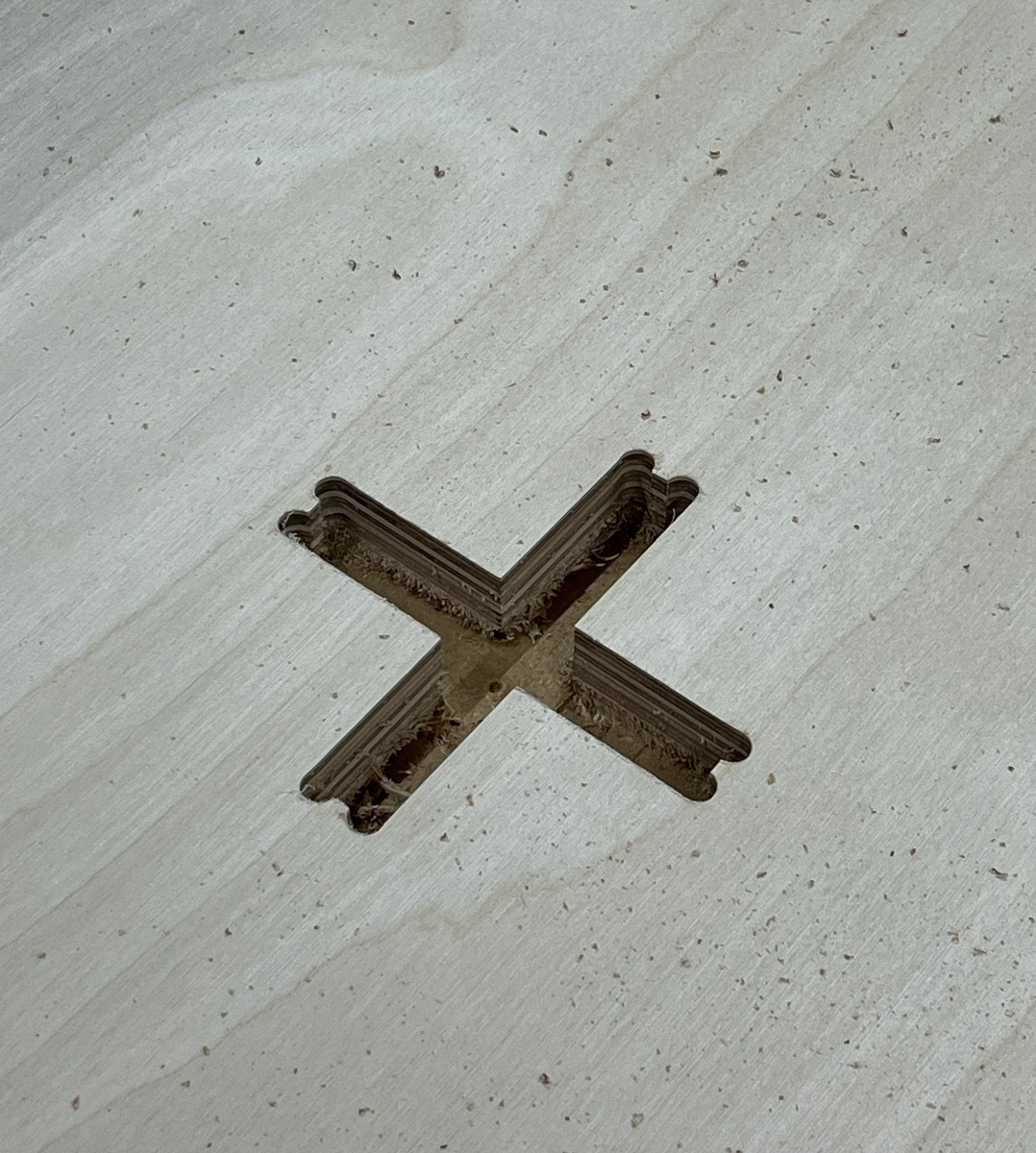 Pocketed Cross