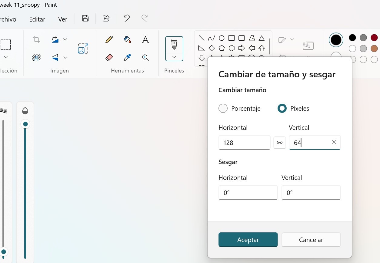 Paint — Resize dialog showing 128 × 64 pixels selected for the Snoopy image
