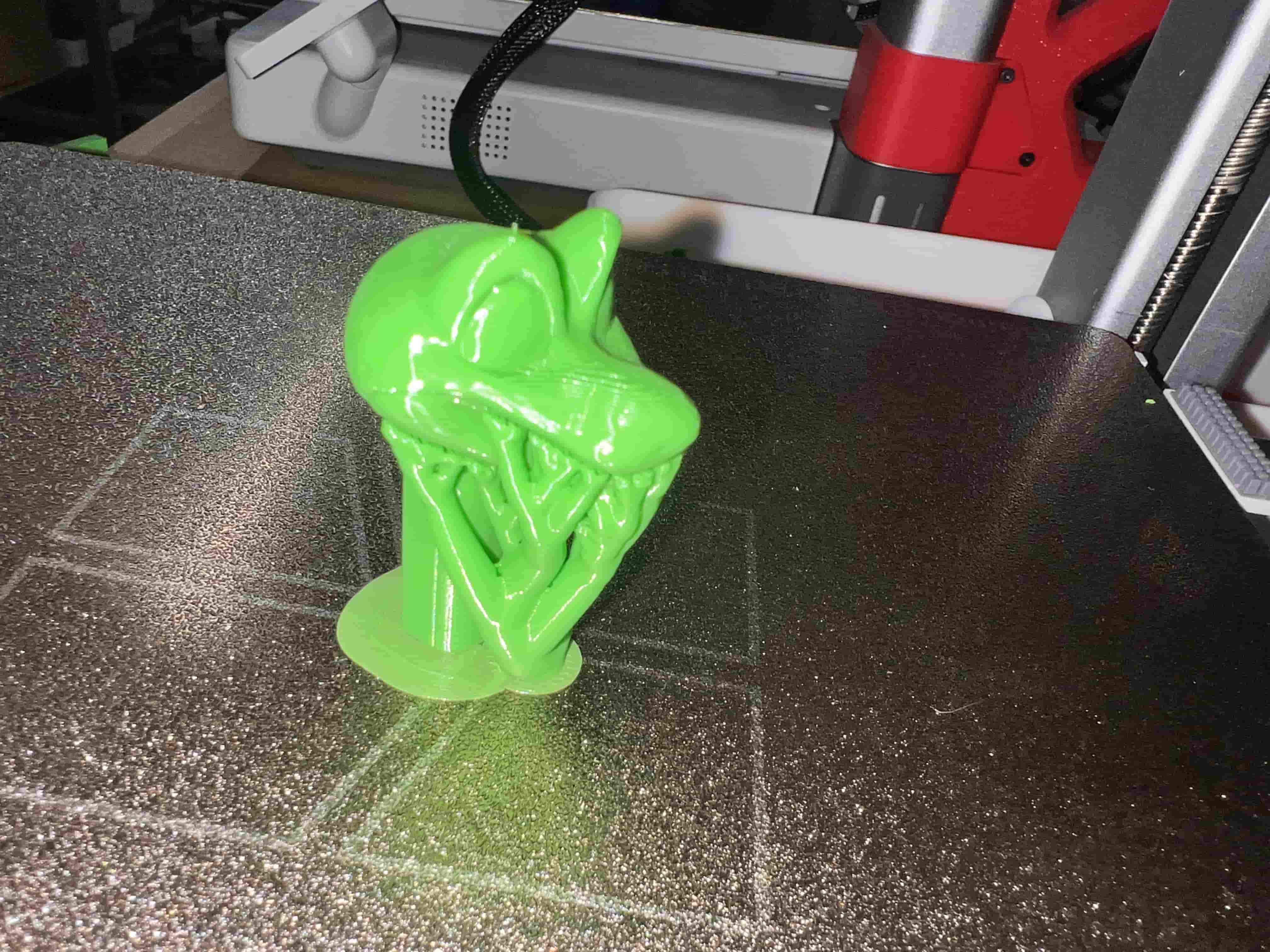 Green PLA print with supports
