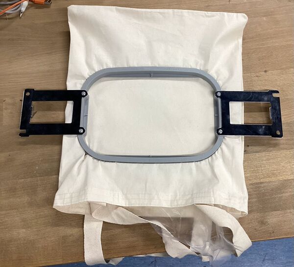 Hoop alignment with stabilizer and fabric