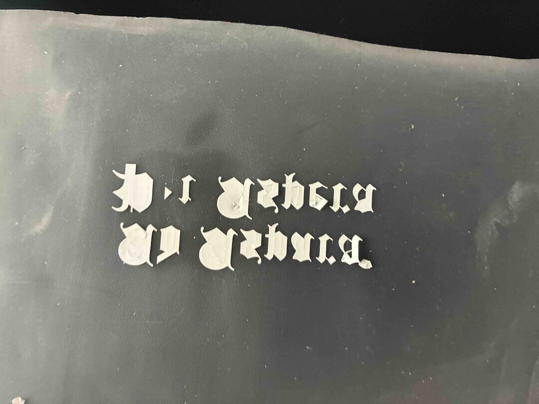 Vinyl on transfer tape.