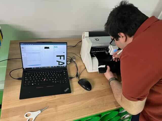 Weeding the first vinyl cut.