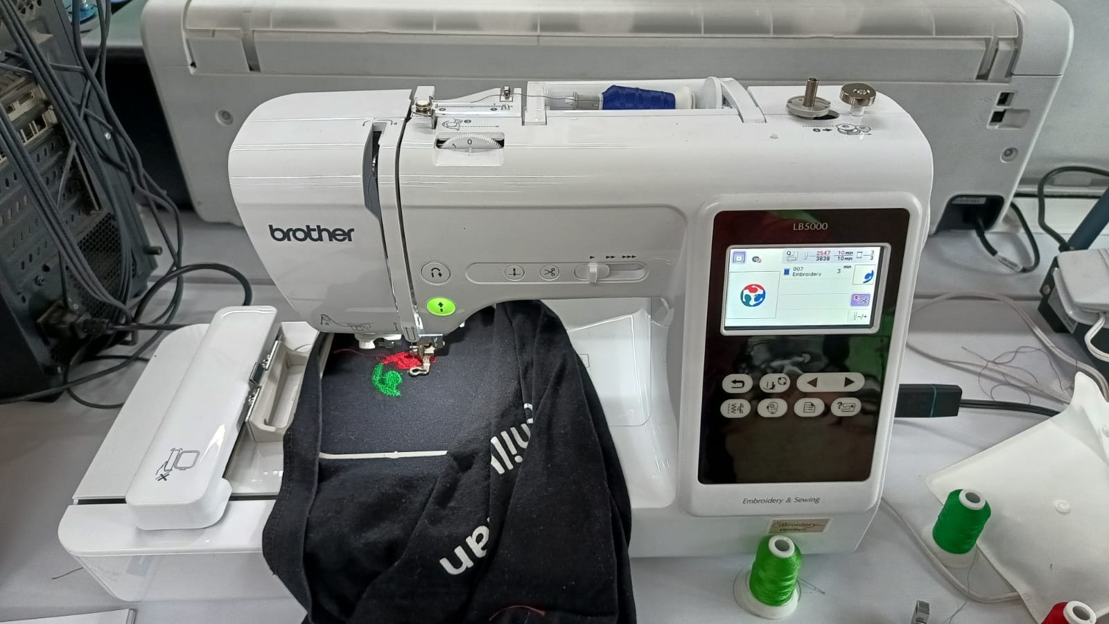Hooping the garment before embroidery