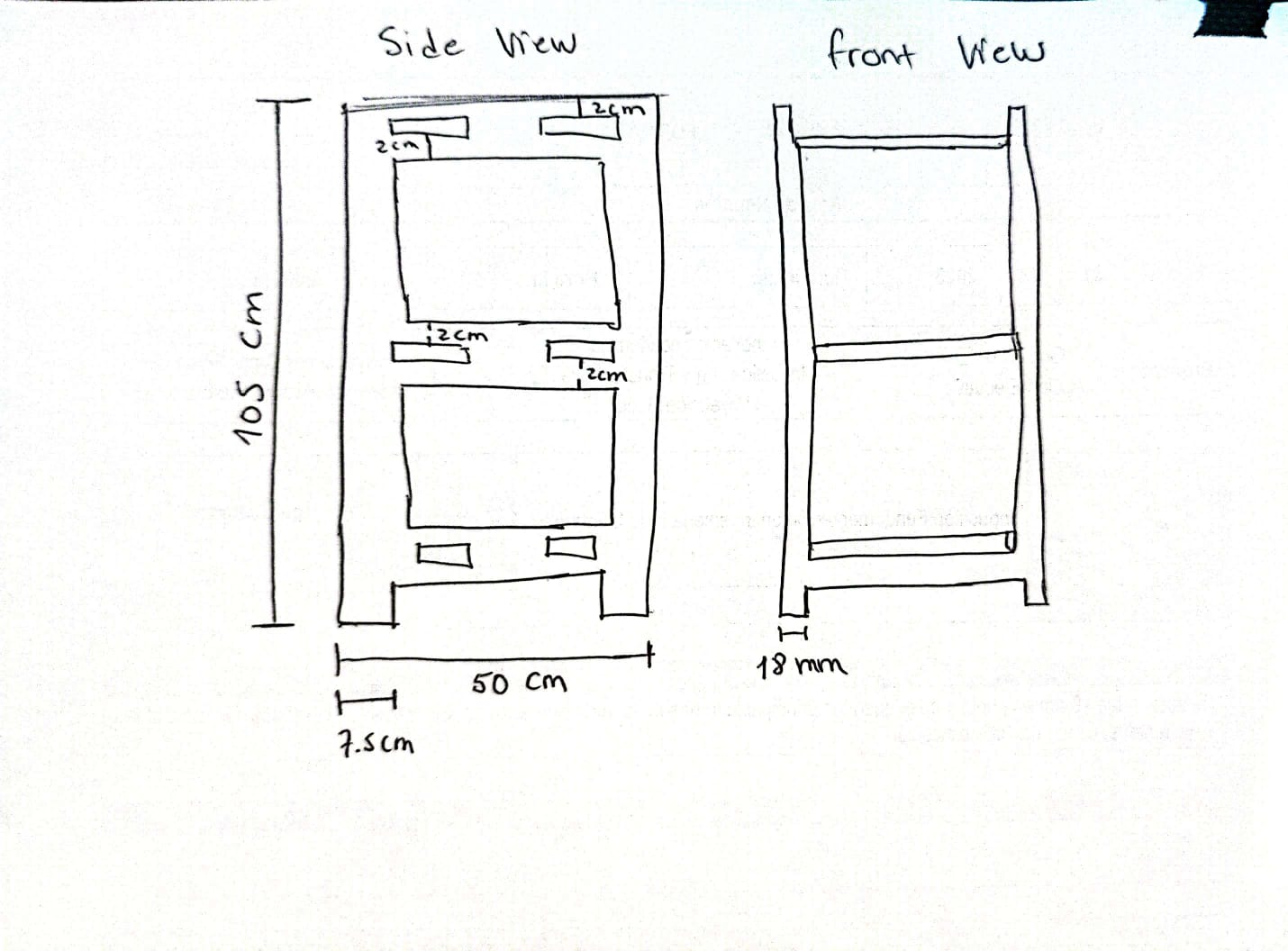 Notebook sketch of furniture side and front views with dimensions