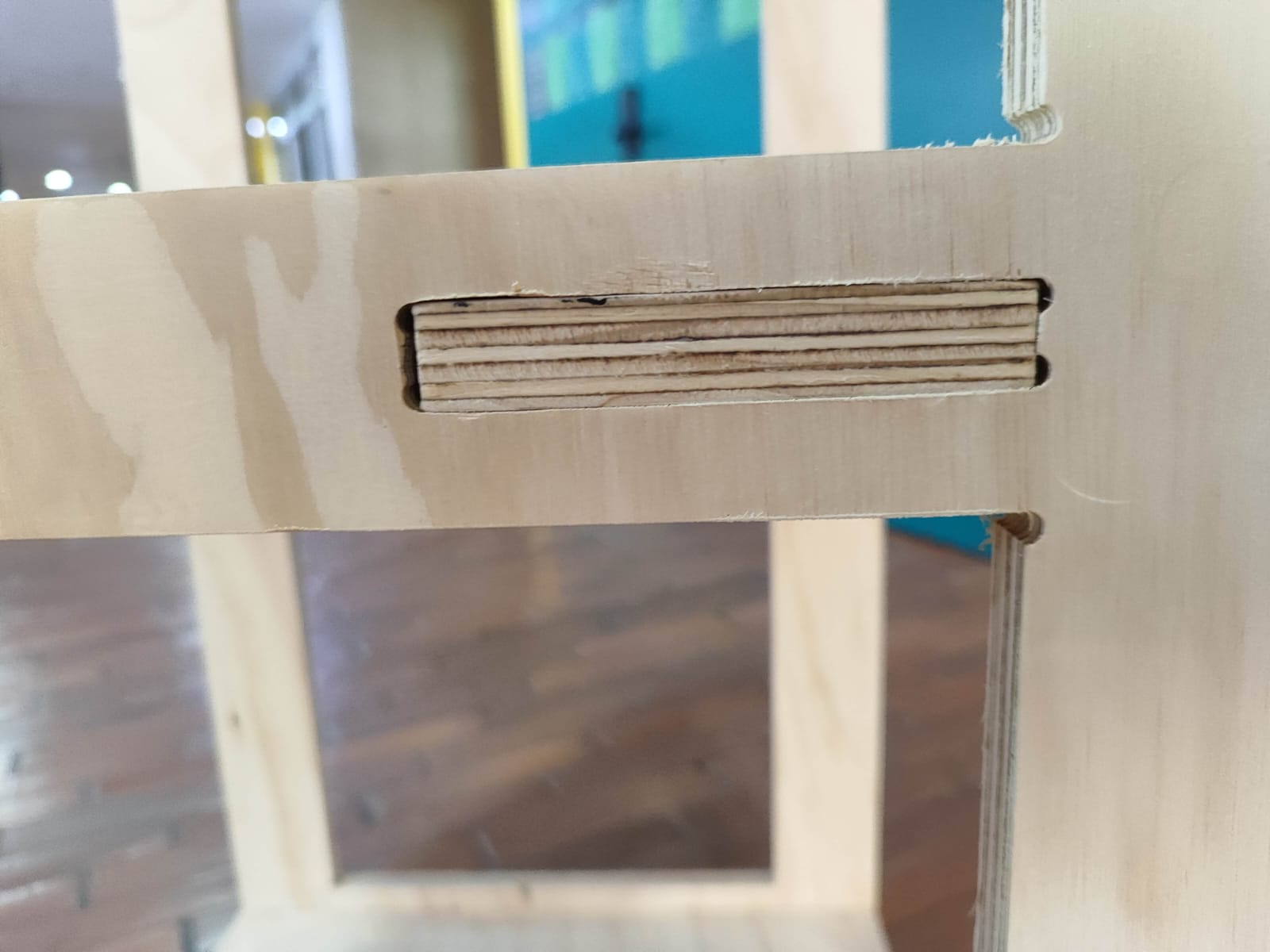 Visible dog-bone reliefs in assembled furniture corners