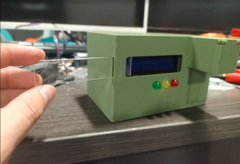 Laser-cut acrylic panel fitted to base