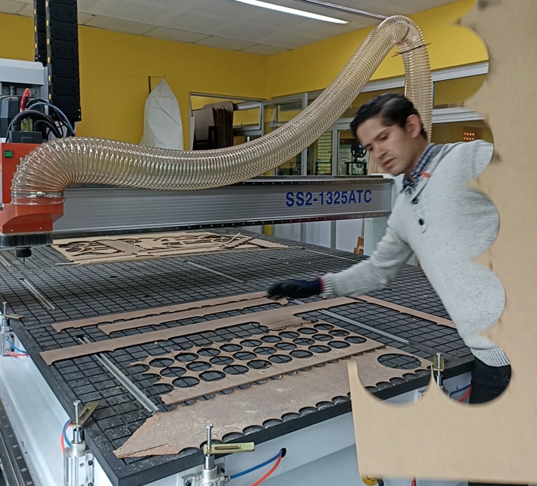 Sacrificial MDF board being installed