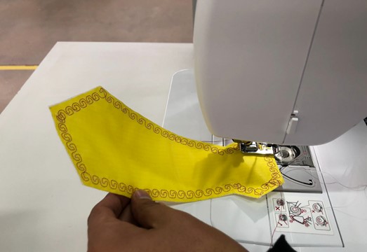 Tie with finished decorative stitching