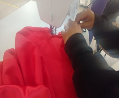 Placing the fabric on the sewing machine