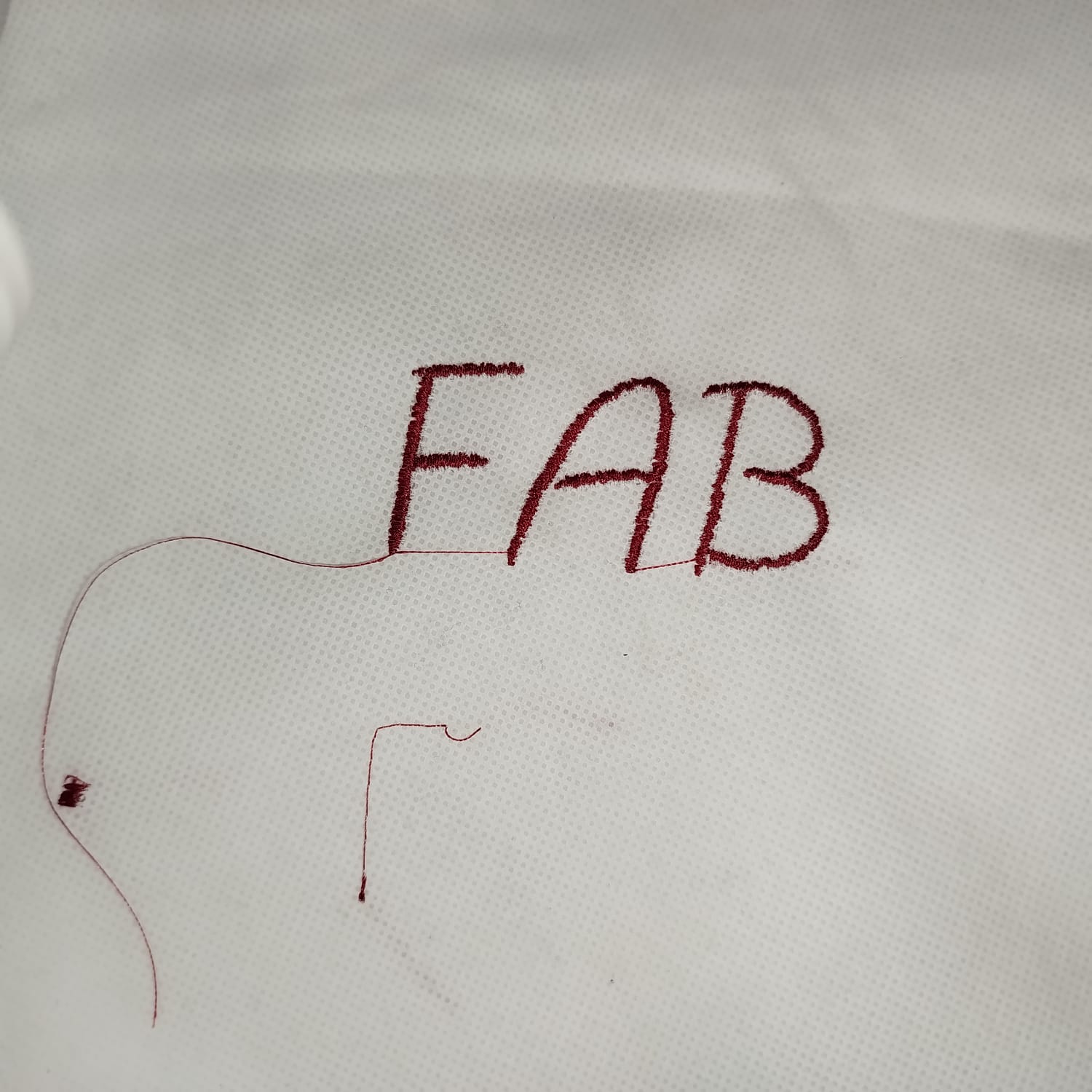 Embroidery test with visible thread tension problems