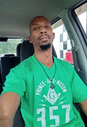 Justyn with green Masonic shirt