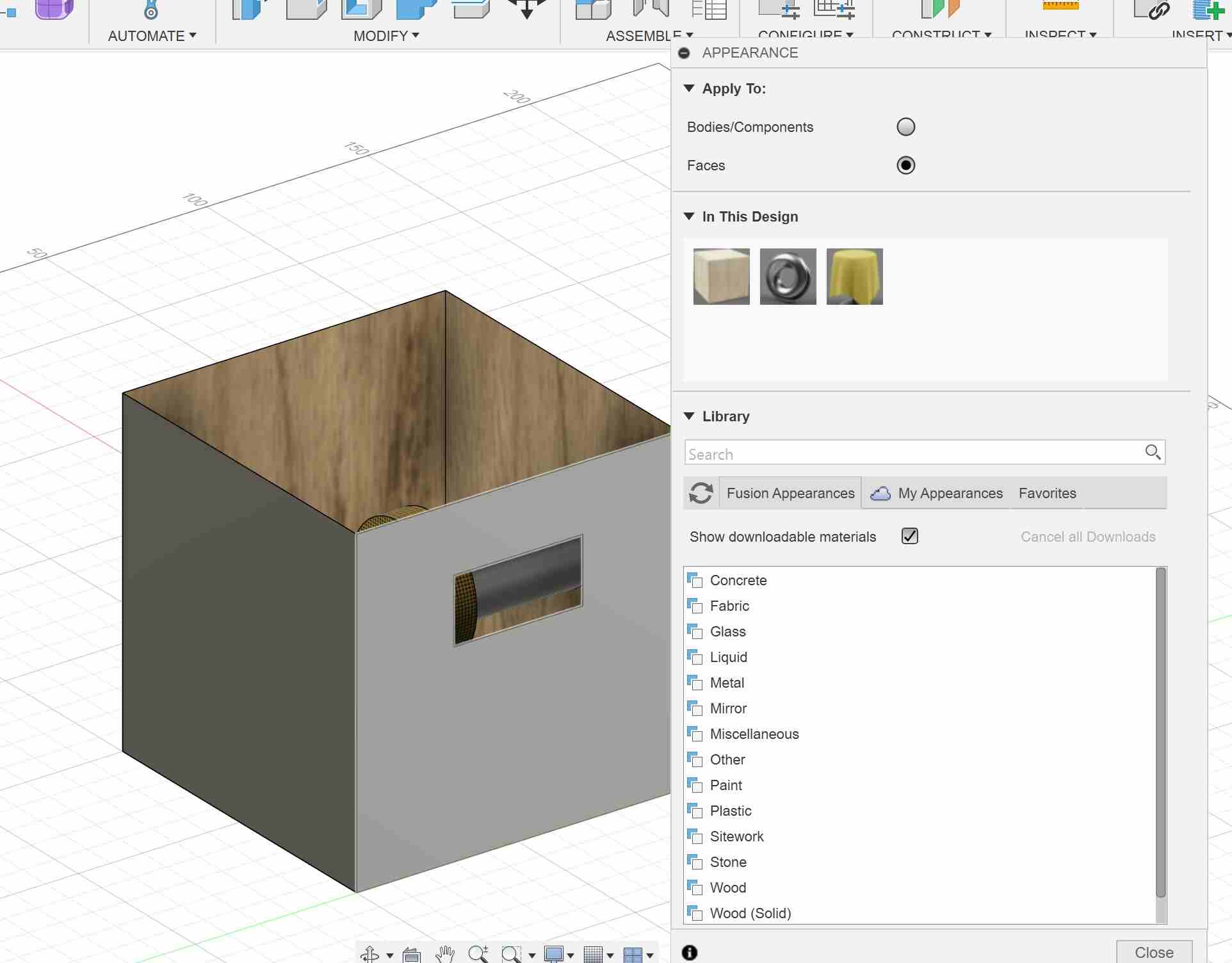 Screenshot of Autodesk Fusion. Changing appearance of box from steel to oak