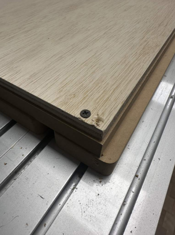 picture of plywood mounted to spoil board