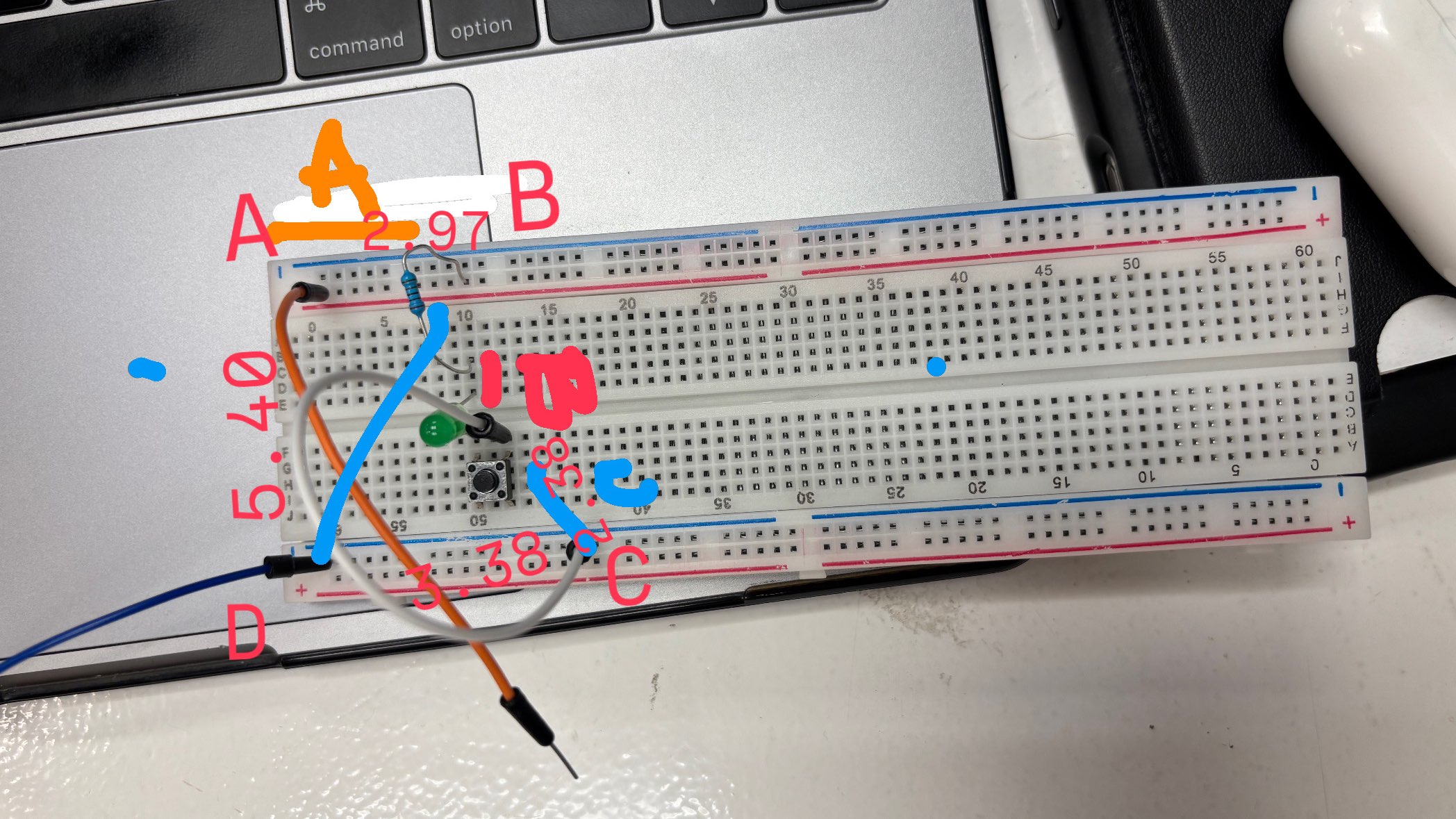 Breadboard annotated with measurement points