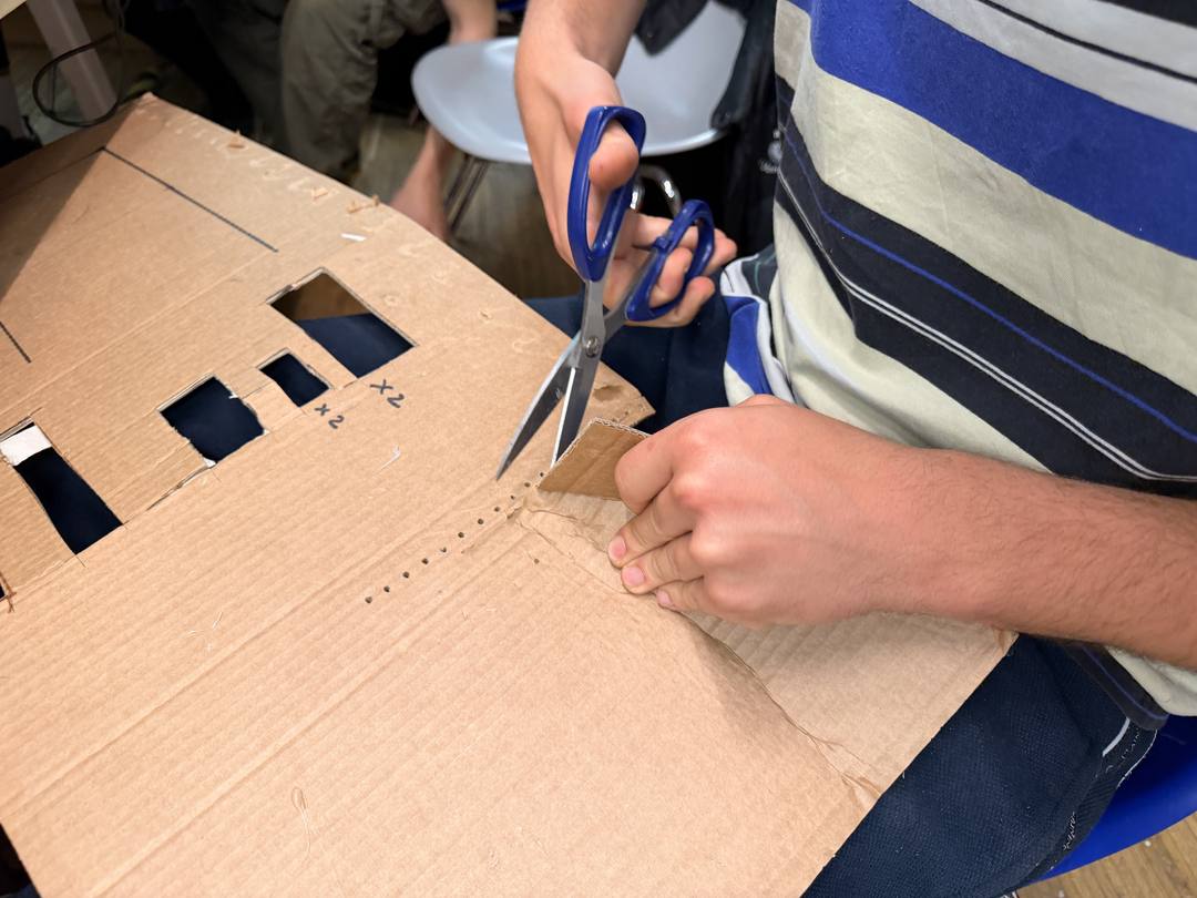 Cutting cardboard for robot body