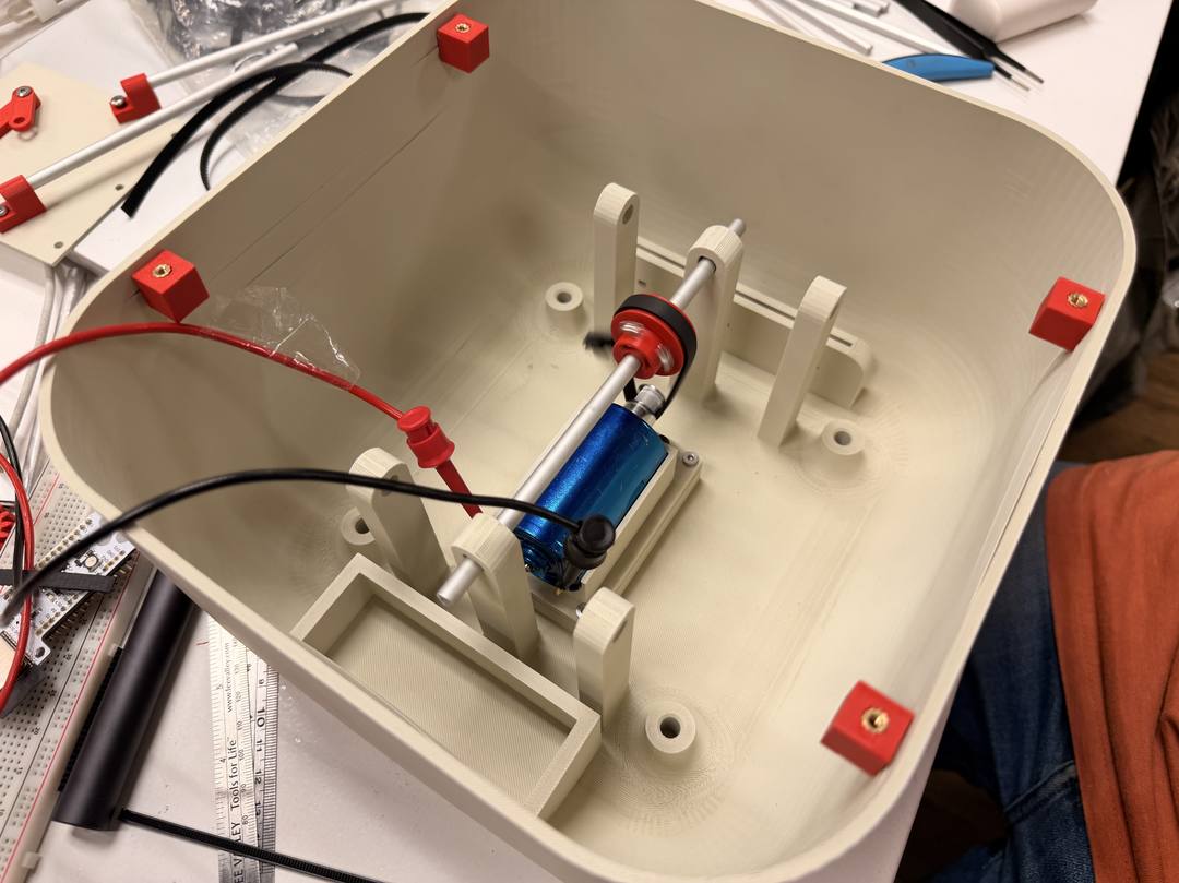 Motor and belt drive system mounted inside the creature body
