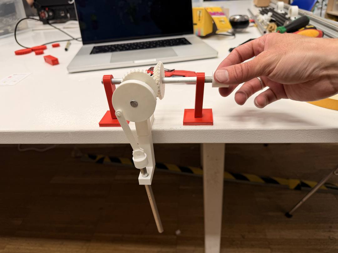 3D printed single leg crank-and-slider test mechanism on a table