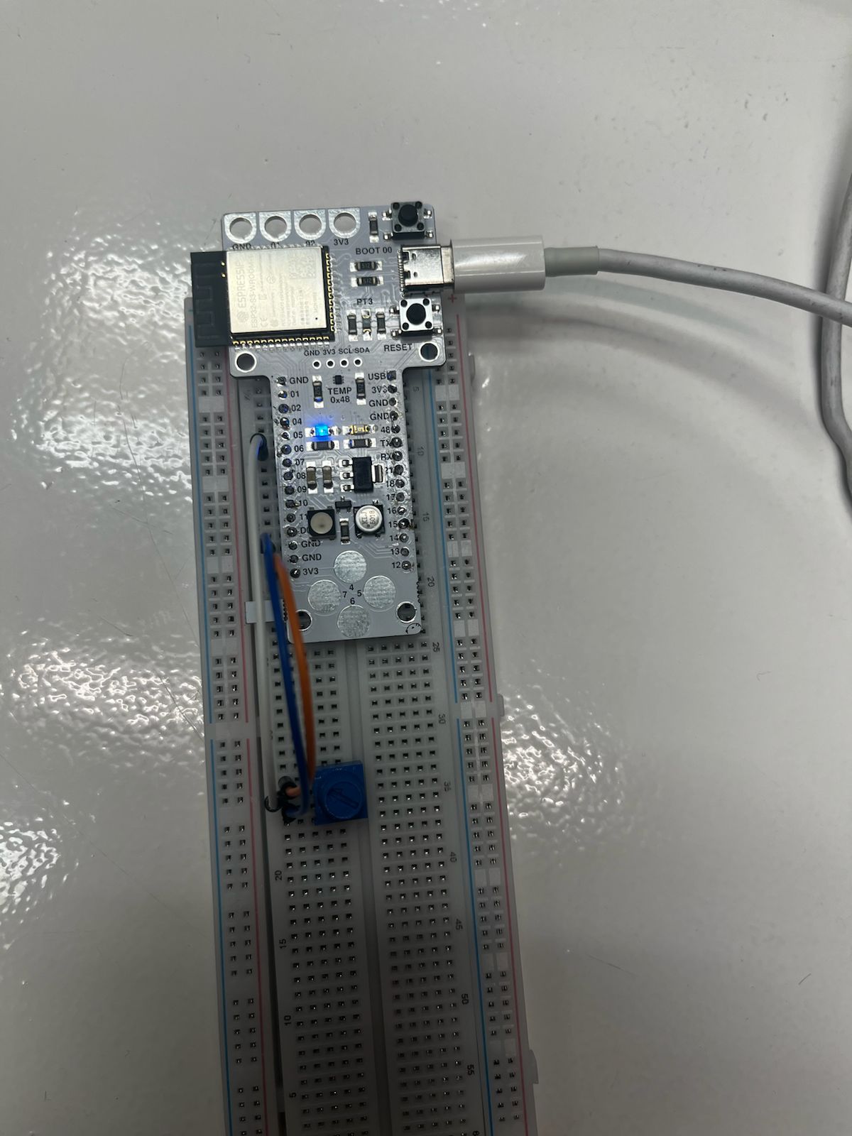 Board connected to breadboard and powered