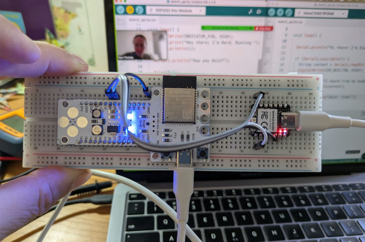 Two boards connected on breadboard